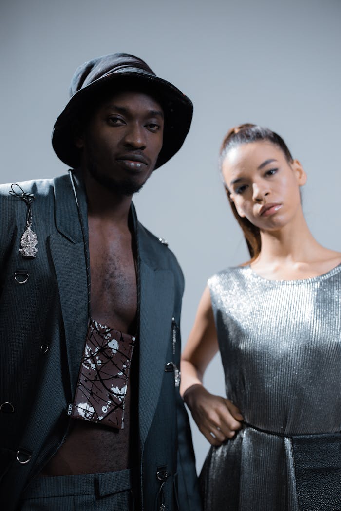 Mastering the First Impression: Your intriguing post title goes here Portrait of a diverse couple in modern fashion with cool tones.